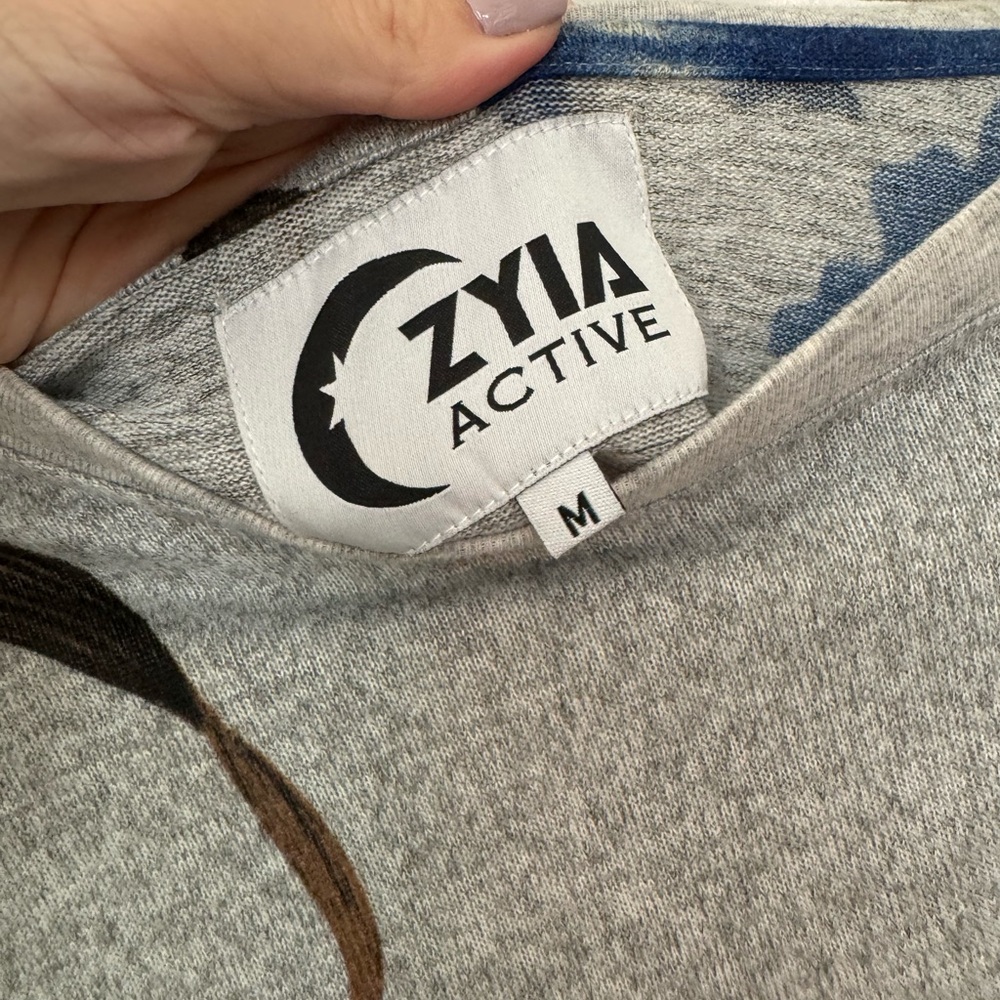 Zyia gray floral cropped sweatshirt. Good used condition.  Size medium - Picture 4 of 7